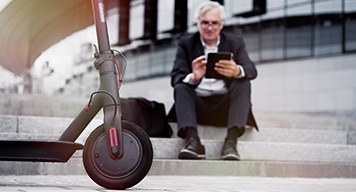 men-using-phone-for-mobility-updates