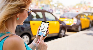 Woman-checking-the-car-sharing-app
