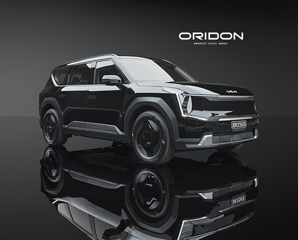 Glossy black Kia EV9 in-studio product shot.