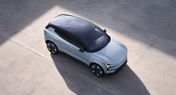 White car parked, symbolizing mobility