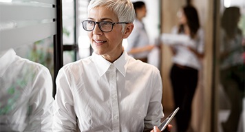 Business woman holding tablet