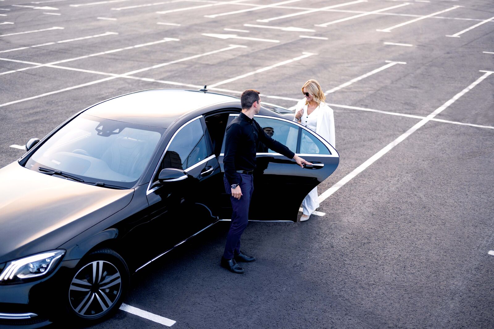 Person opening a car door