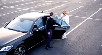 Person opening a car door