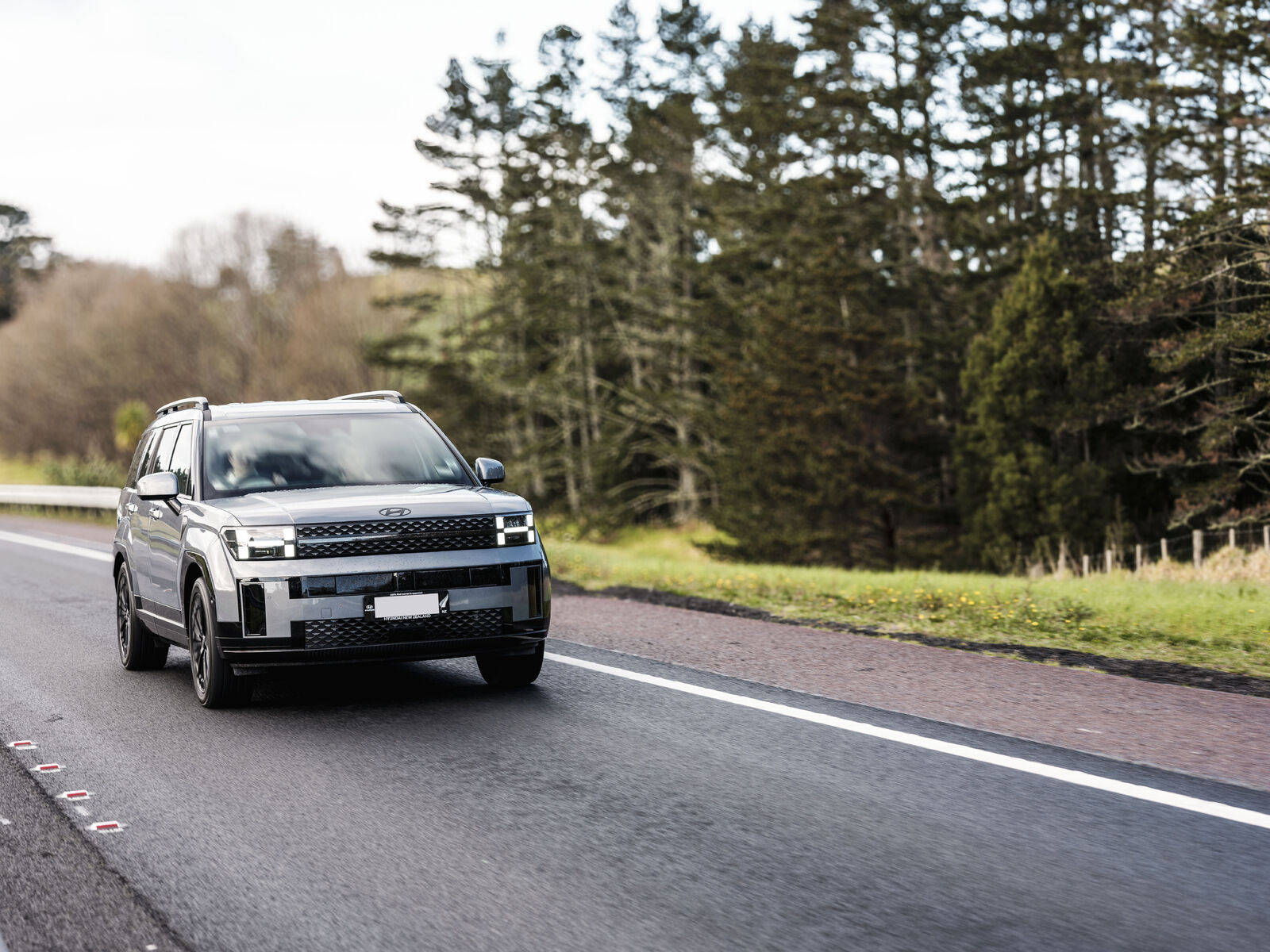 SUV driving on New Zealand motorway