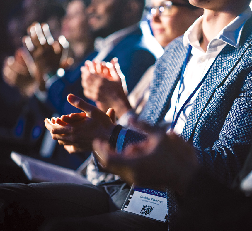 close-up-of-audience-clapping-at-a-professional-event