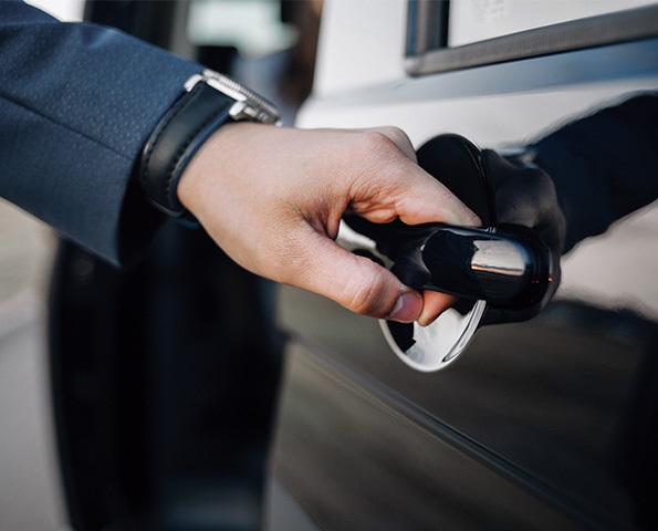 close-up-of-business-professional-opening-car-door