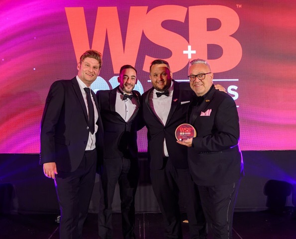 sg-fleet-staff-accepting-wsb-award-on-stage