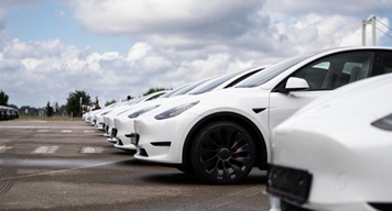 a fleet of white electric cars
